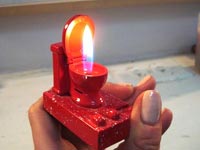 Toilet seat cigarette lighter